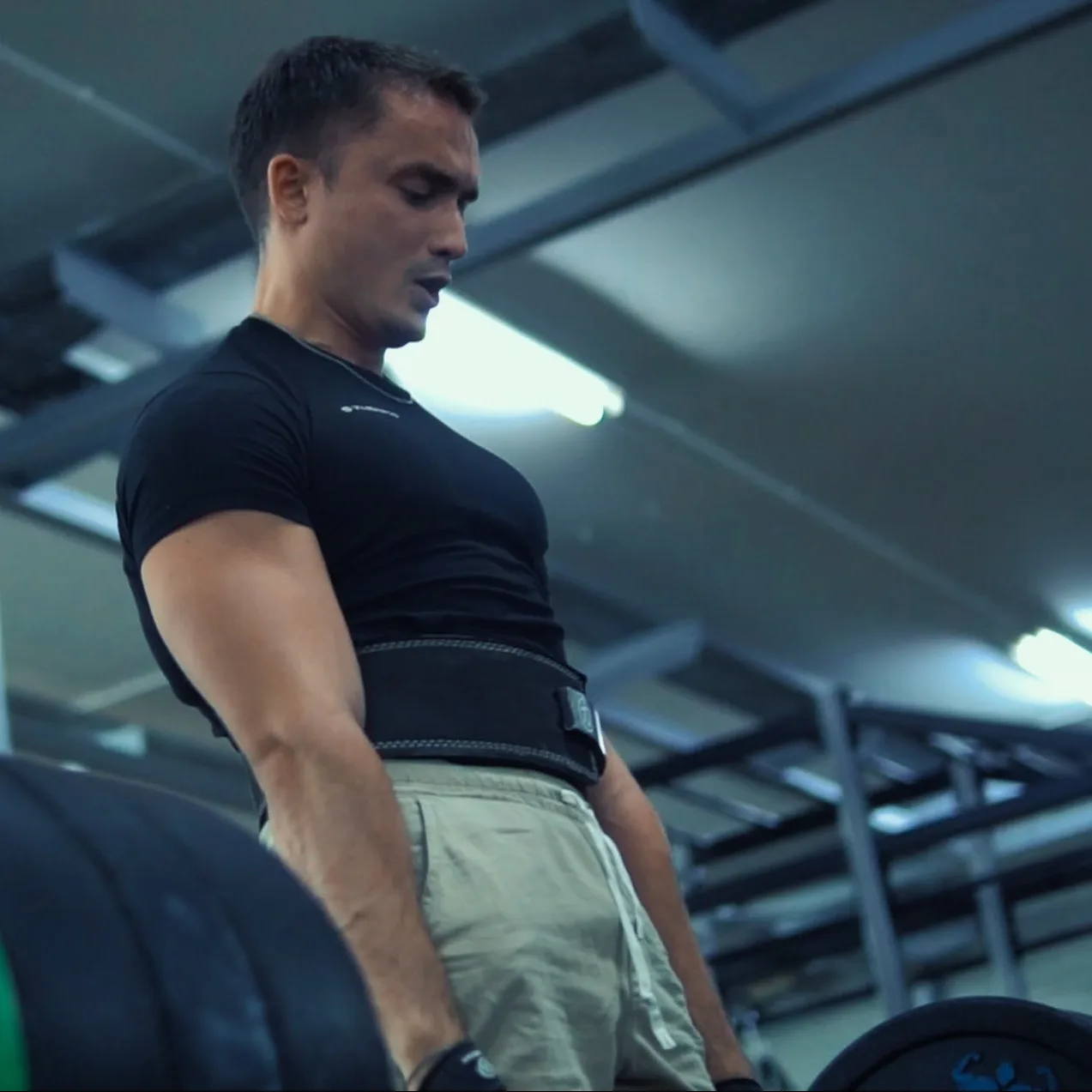 Leo Gasi preparing a heavy barbell lift