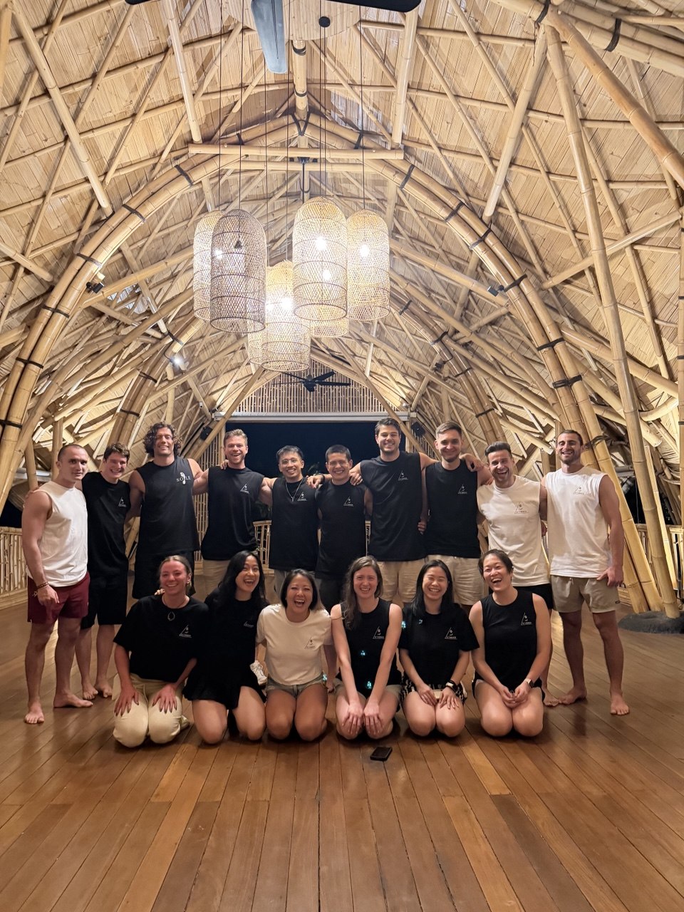 The 2026 retreat group inside the bamboo shala