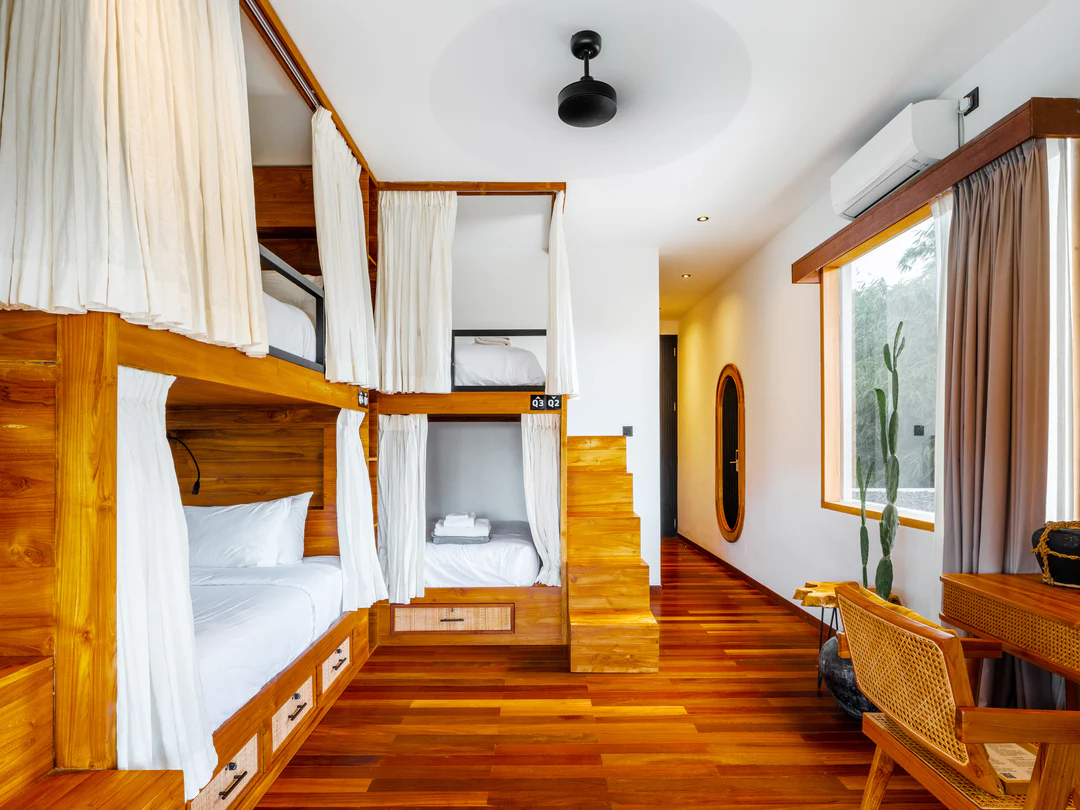 Quad shared room with custom teakwood bunks