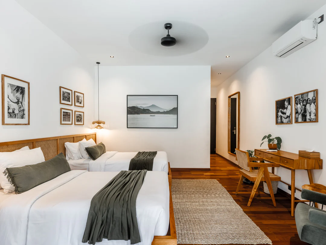 Shared suite with balcony over the pool